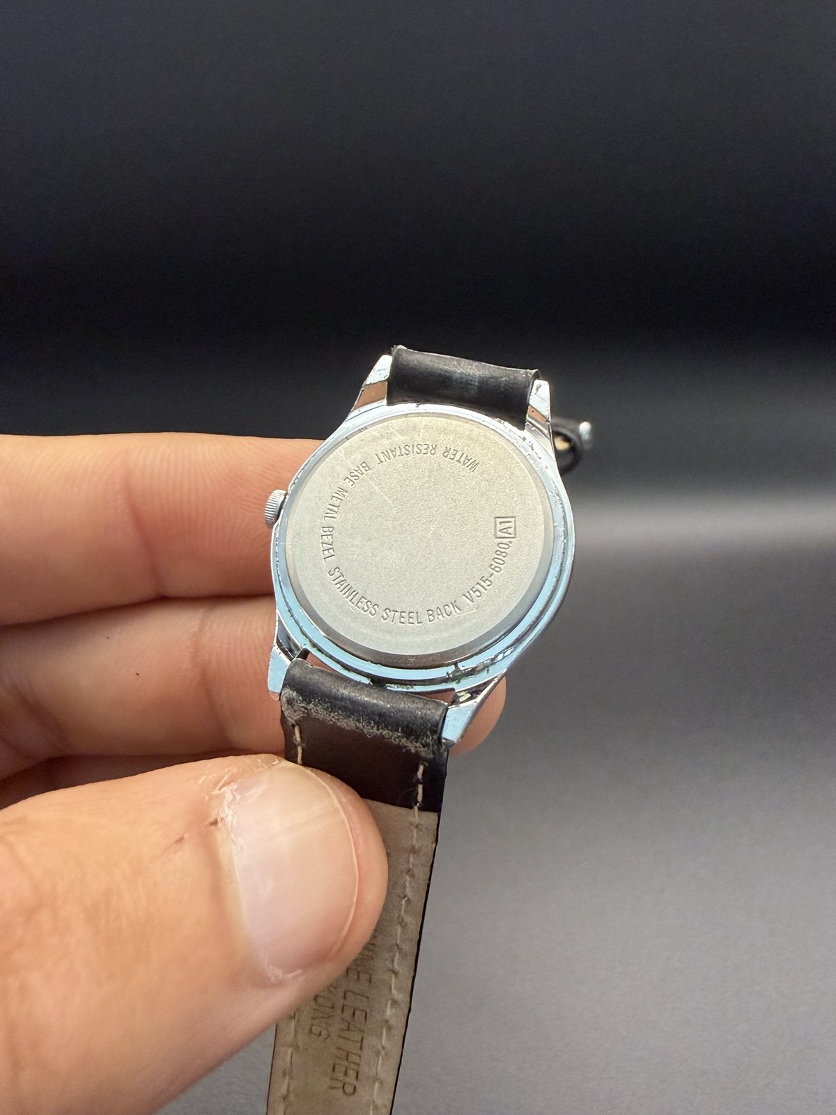 Lorus caseback engraved V515-6080, stainless steel back, water resistant