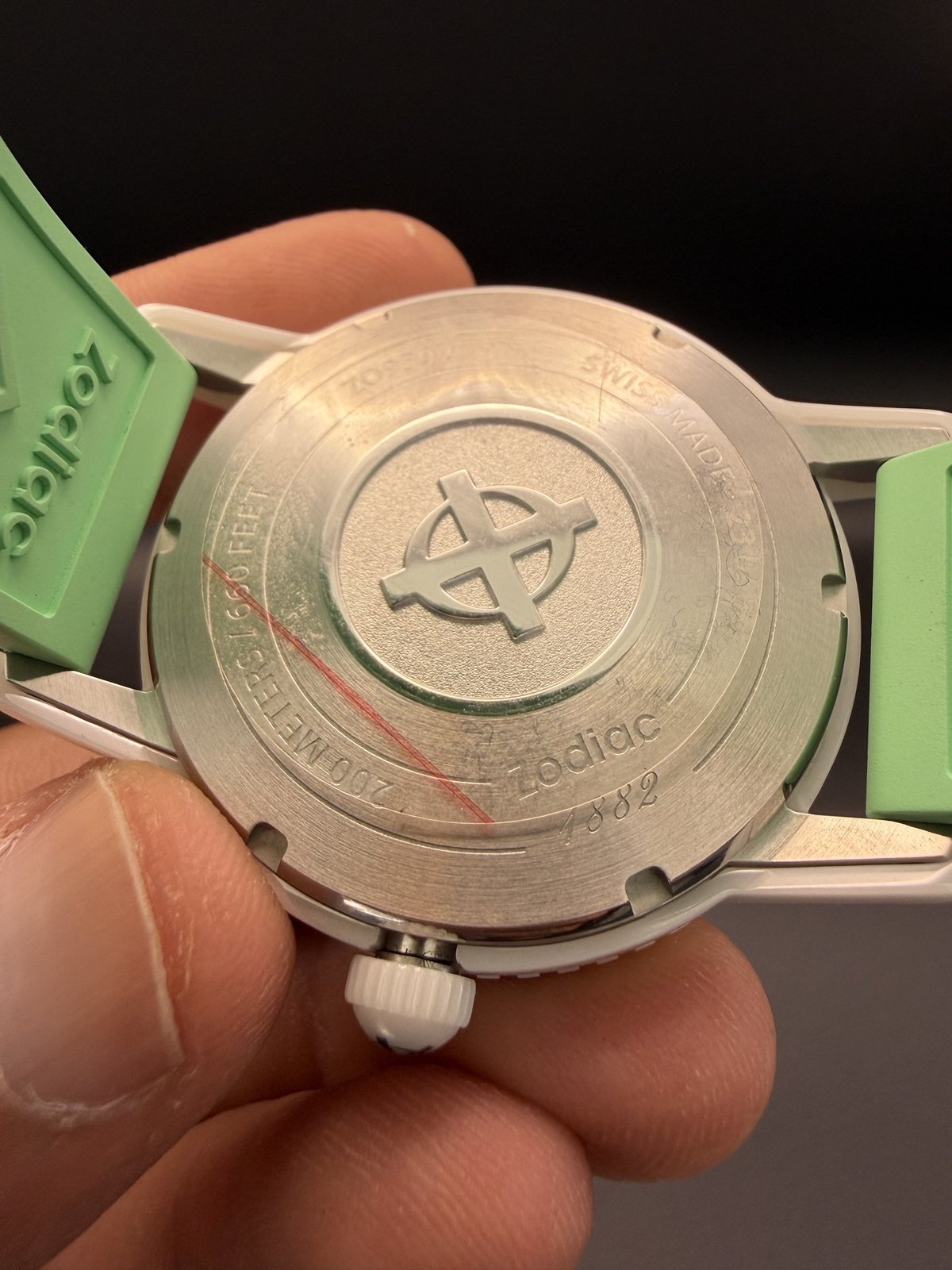 Zodiac caseback with crosshair logo, 200 meters, Swiss made